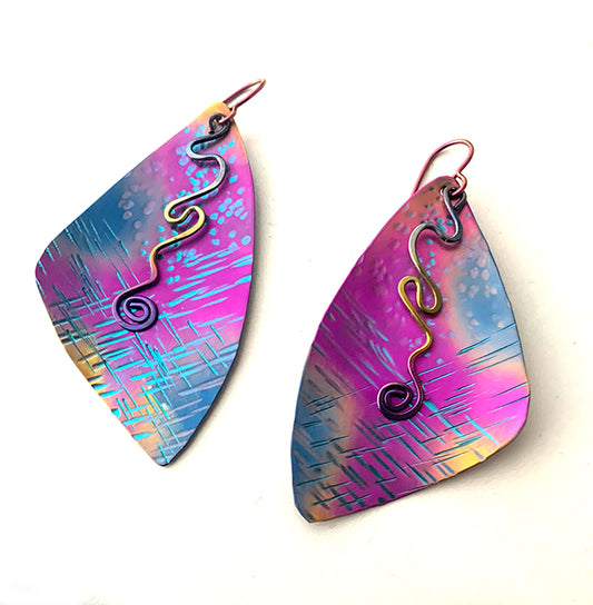 fuchsia, blue, and gold textured large niobium earrings with rainbow anodized squiggle dangles