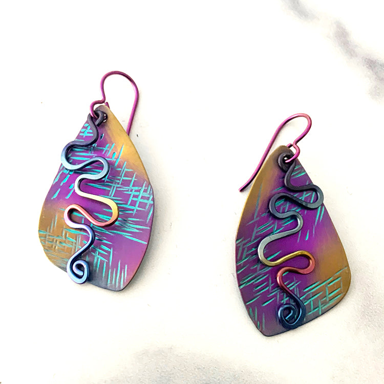 fuchsia, green, and gold textured medium size niobium earrings with rainbow anodized squiggle dangles