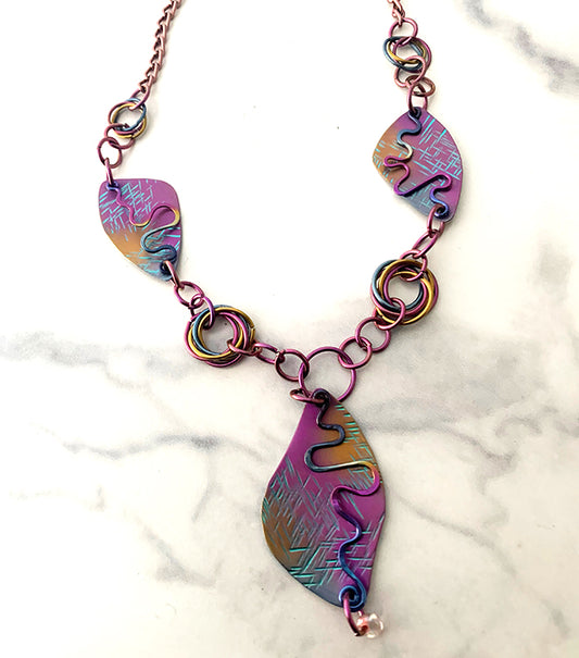 Niobium Necklace with Squiggles and Mobius links
