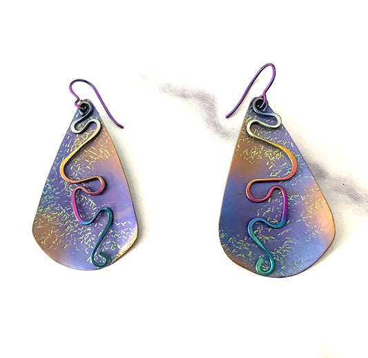 blue purple, gold, and rose gold textured teardrop shaped niobium earrings with rainbow anodized squiggle dangles