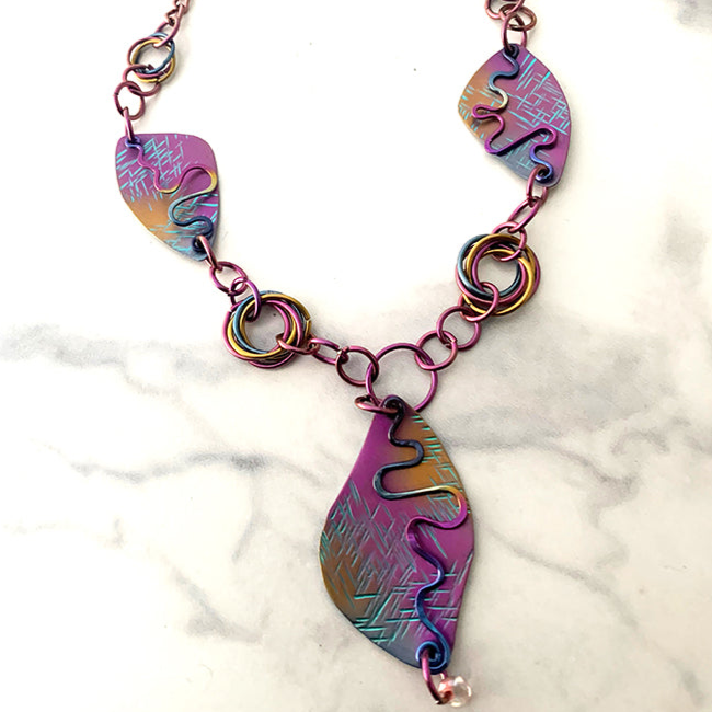 Niobium Necklace with Squiggles and Mobius links